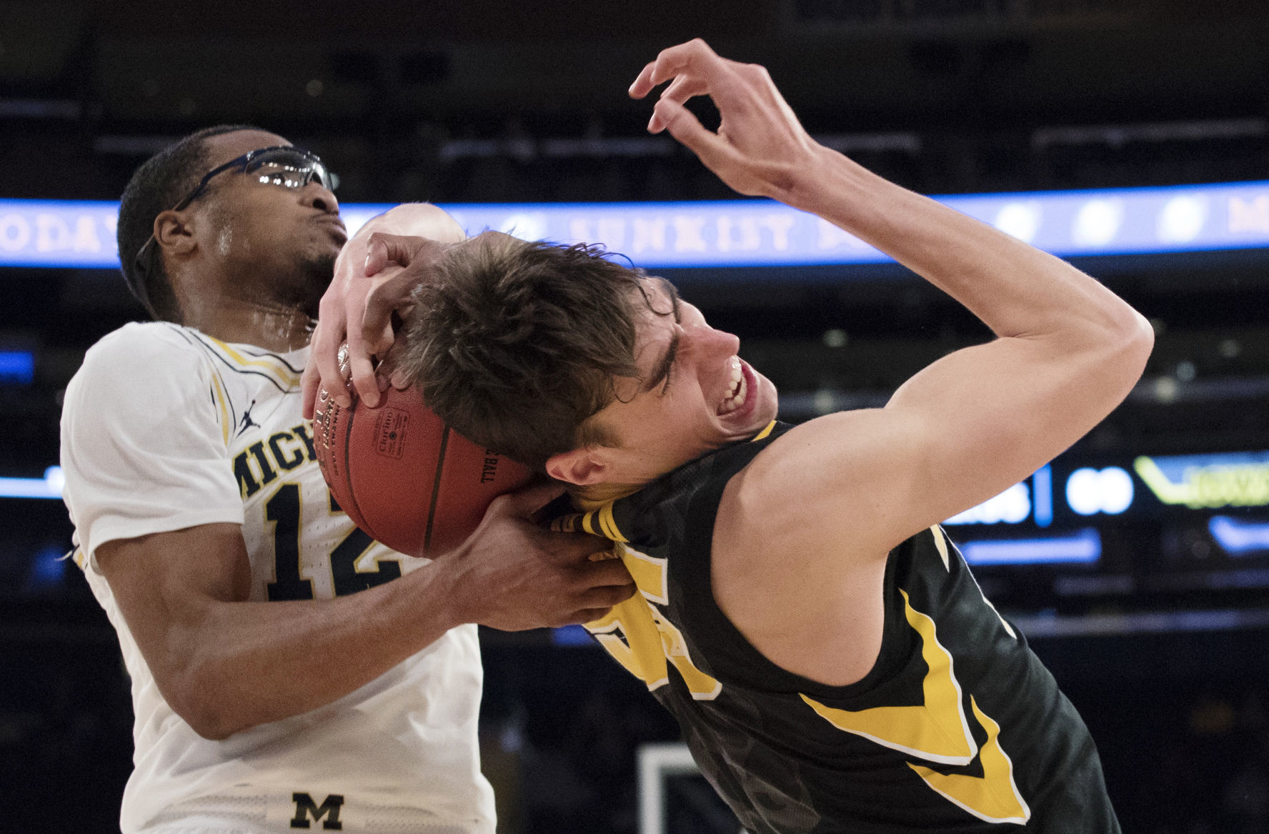 APTOPIX B10 Iowa Michigan Basketball